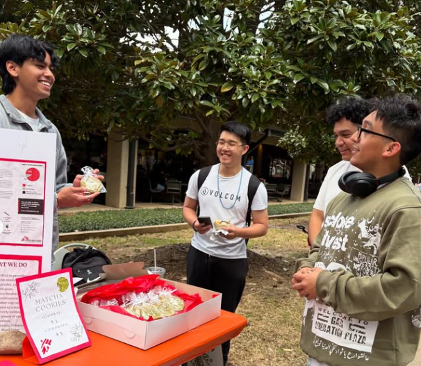 Fellow UTD Students learning about our club!
